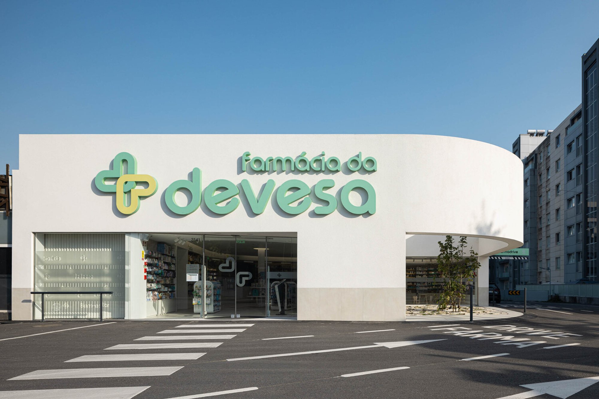 Modern Pharmacy Design Architecture: Devesa Pharmacy by Tsou Arquitectos