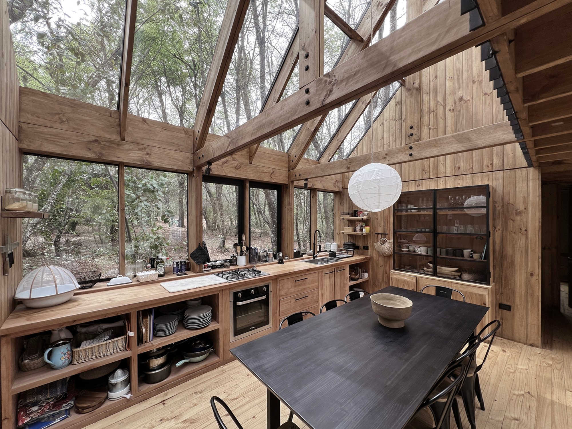 Greenhouse by Juan Carlos Sabbagh Arquitectos: A Glazed Forest Retreat in the Andes