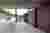 This architectural image showcases a modern structure within a cemetery setting. The design features