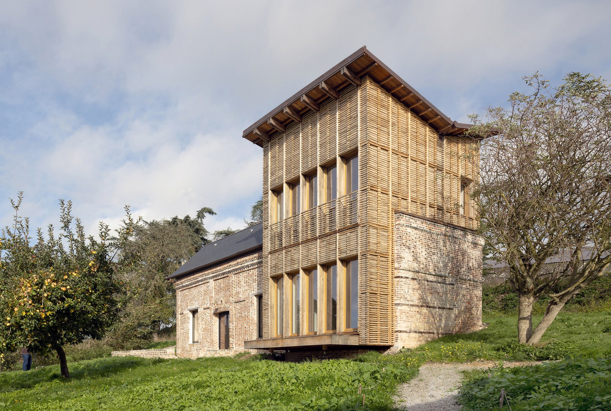 Sustainable House Renovation with Local Materials in Normandy: Le Costil House by Anatomies d’Architecture