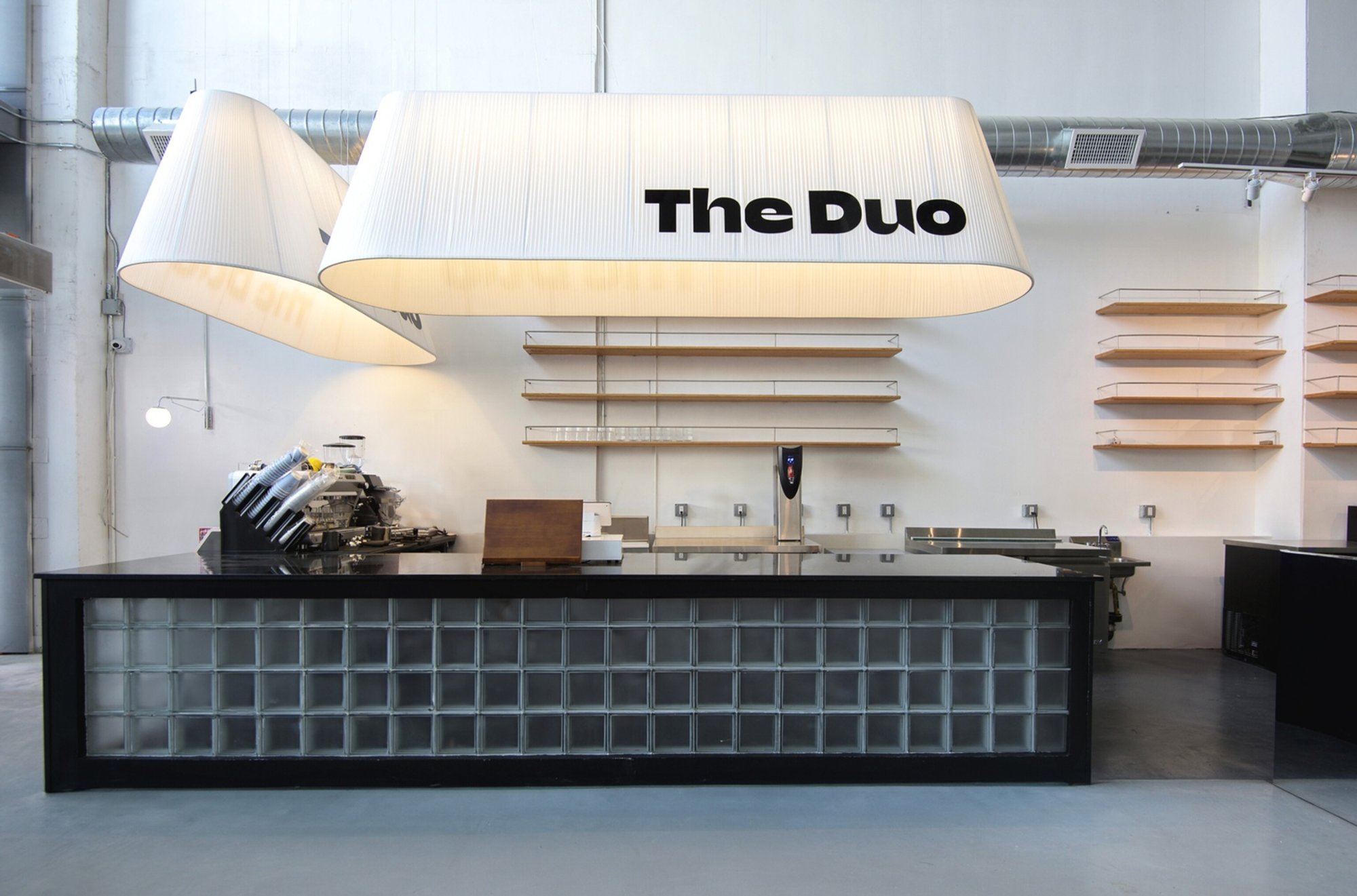 Day-to-Night Coffee Shop Design: The Duo by Design Next Agency