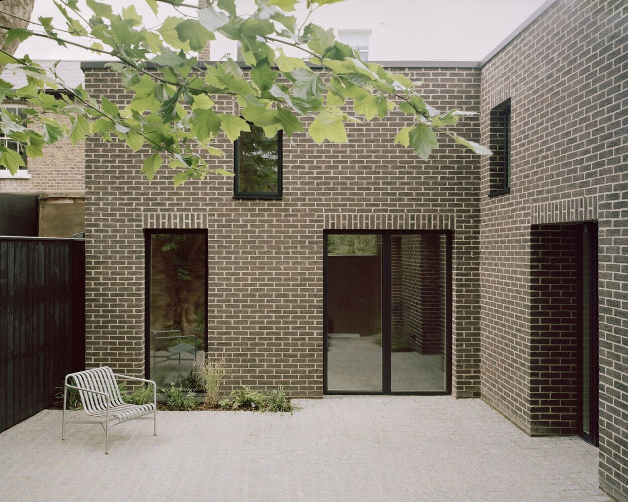 Sustainable Home Design: Tree Courtyard House by ao-ft