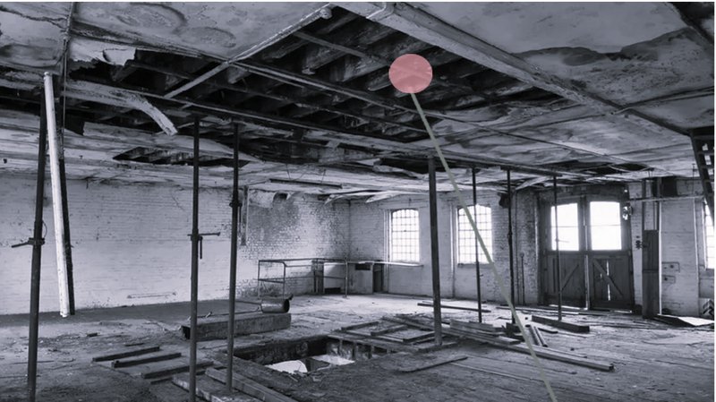 The historic warehouse before its transformation – a relic of the past, ready to be reimagined with sustainability in mind.