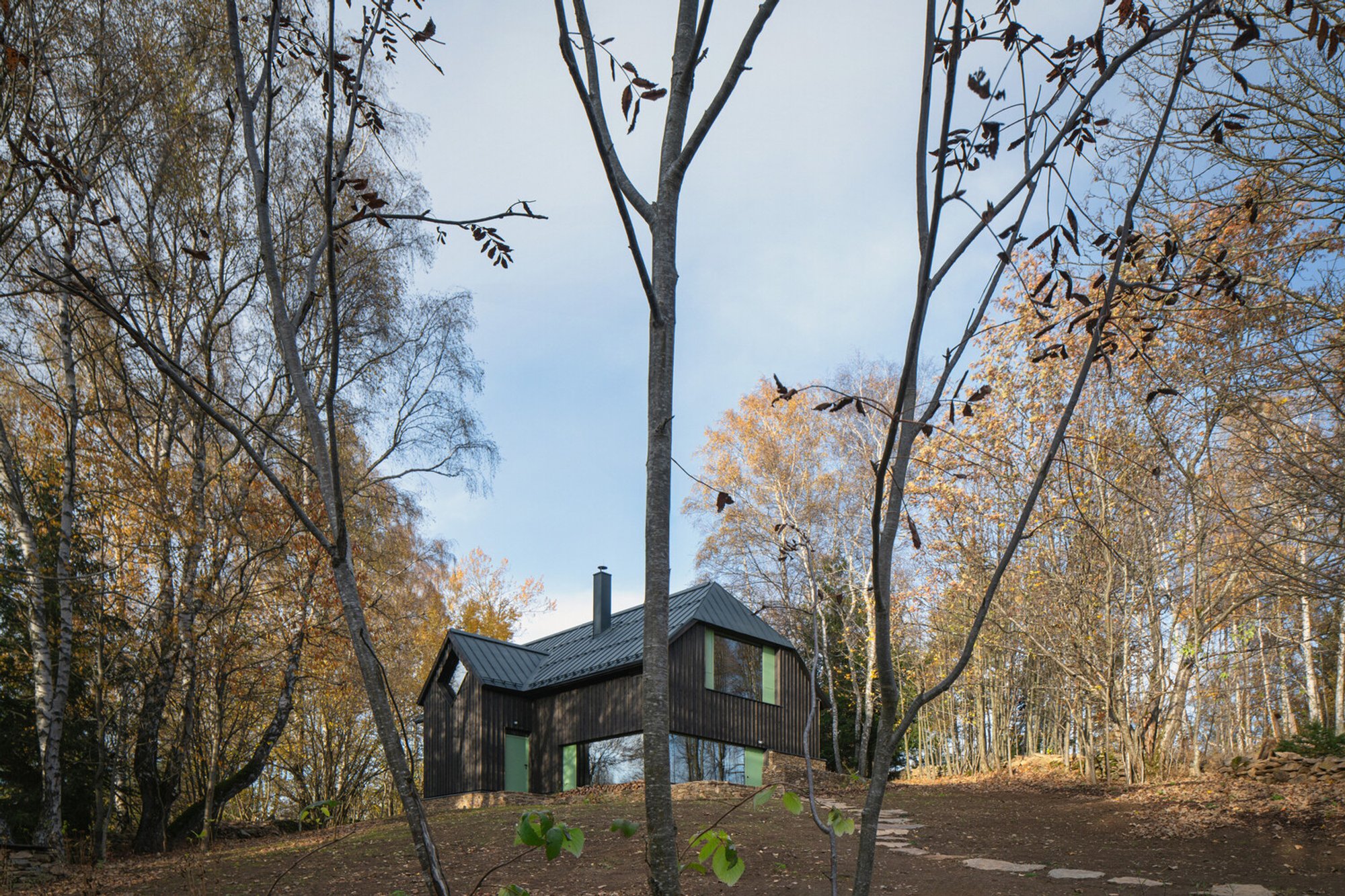Traditional Cottage Design in Šumava: A Harmonious Blend of Nature and Architecture