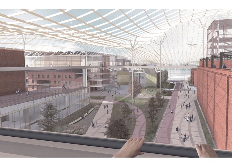 Interior view of the courtyard, highlighting the open green spaces and interconnected pathways.