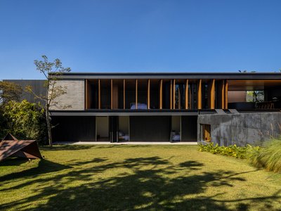 Modern T-Shaped House Design: A Stunning Example by Gui Mattos