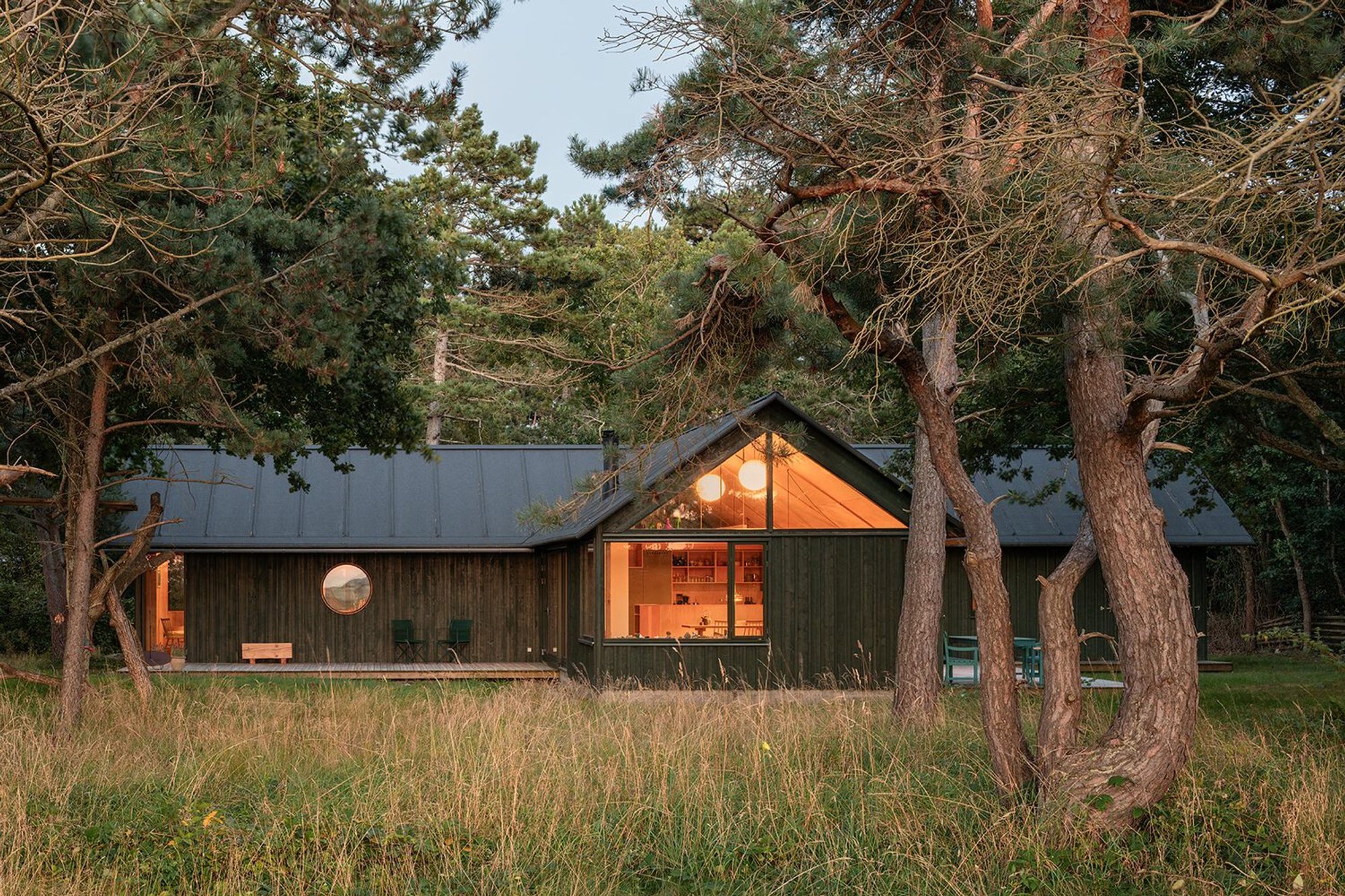 Sustainable Wooden House Design: House Between the Trees by Peter Kjær Arkitekter