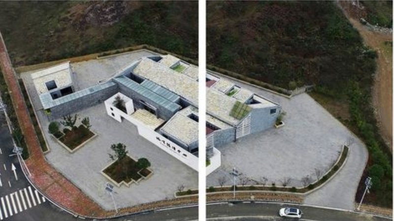 Aerial view of a sustainable building integrating eco-conscious design with functional tourism facilities.