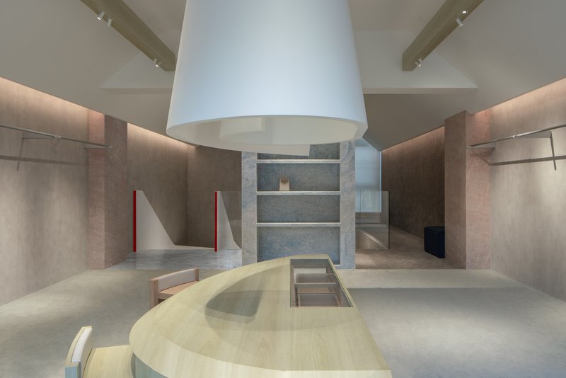 Central white hood above curved timber platform with stone shelving visible in background alcove