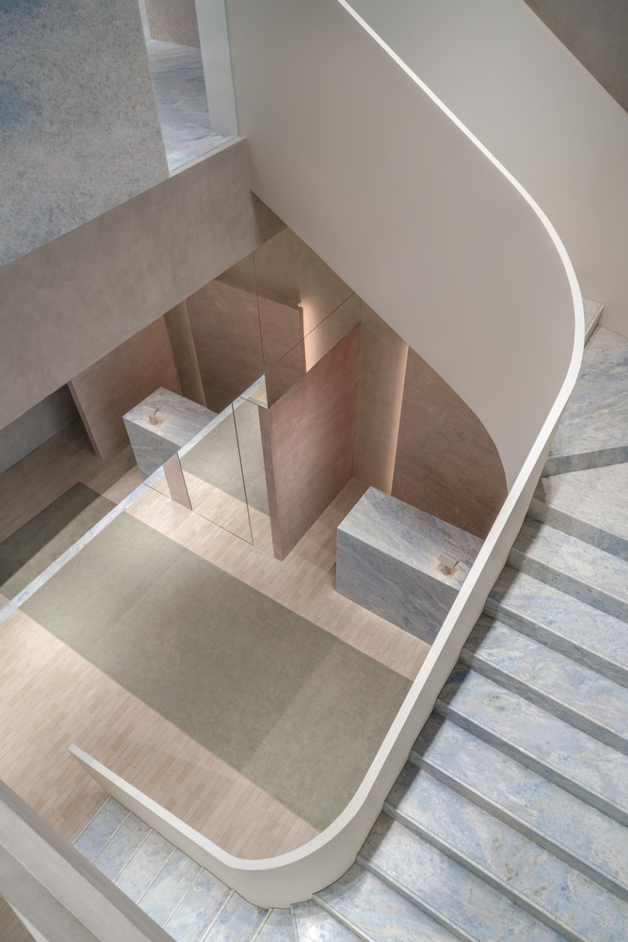 So Studio Sculpts a Pink Marble Interior That Treats Retail Like a Temple