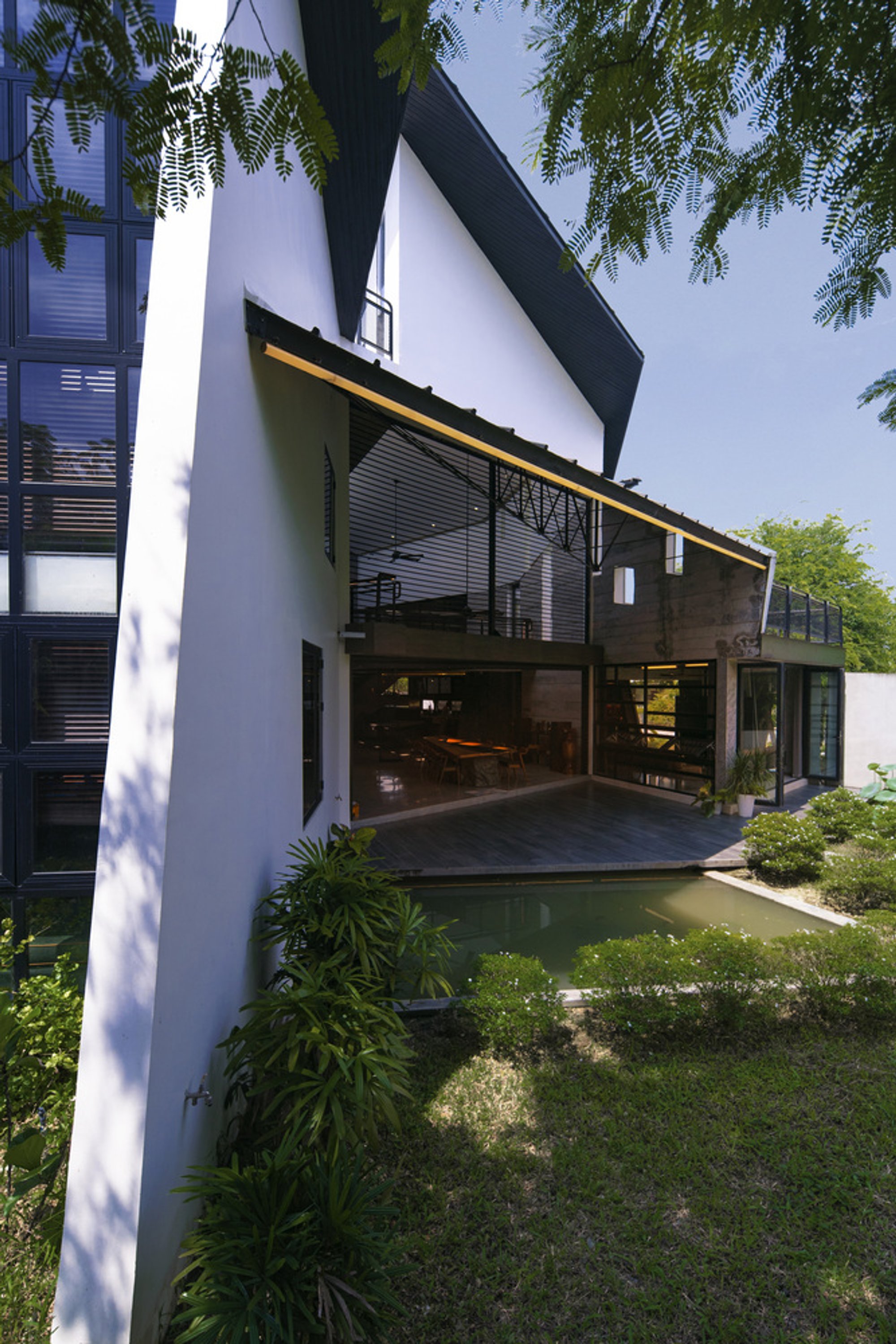 Akitephile Breaks a Vietnamese Family Home into Angular Volumes That Breathe Around Courtyards
