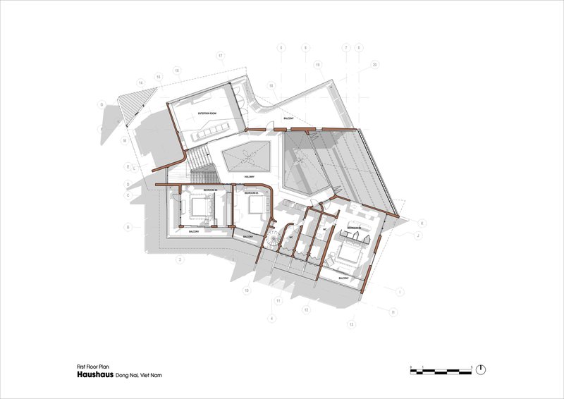 First floor plan drawing showing bedrooms and living spaces distributed across the angled wings