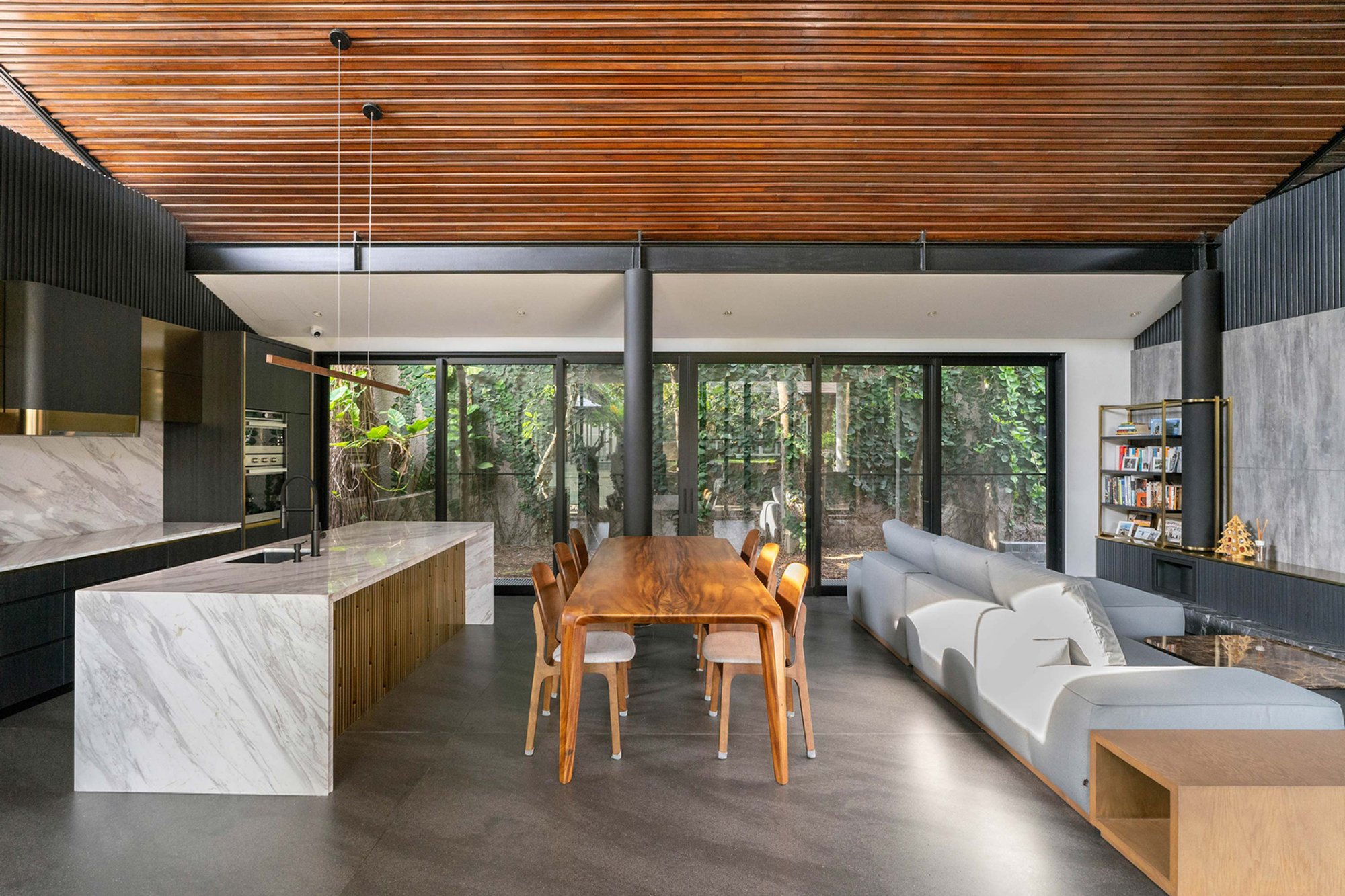 Matter of Something Crafts a Timber-Lined Tropical House That Radiates from a Central Courtyard
