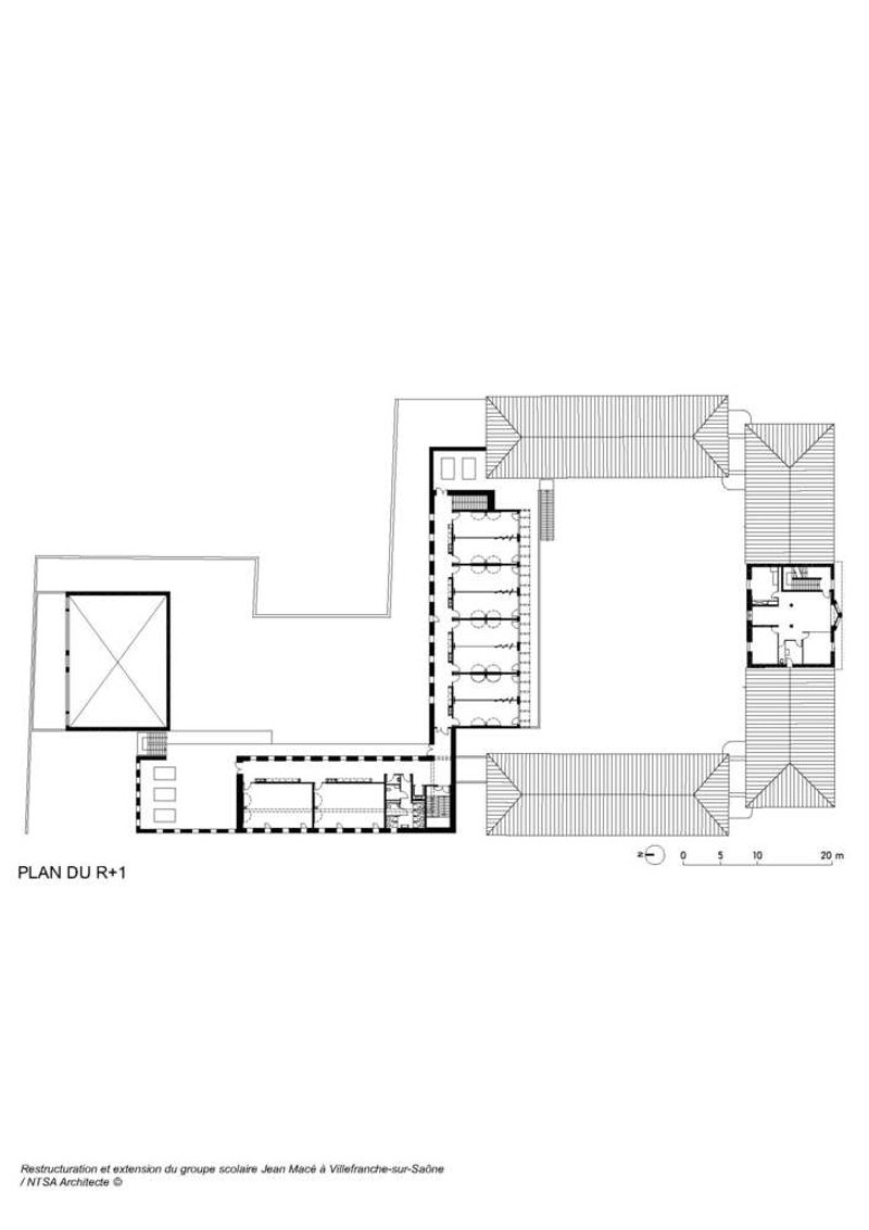 First floor plan: upper classrooms along the gallery walkway, gymnasium double-height roof, rooftop terrace