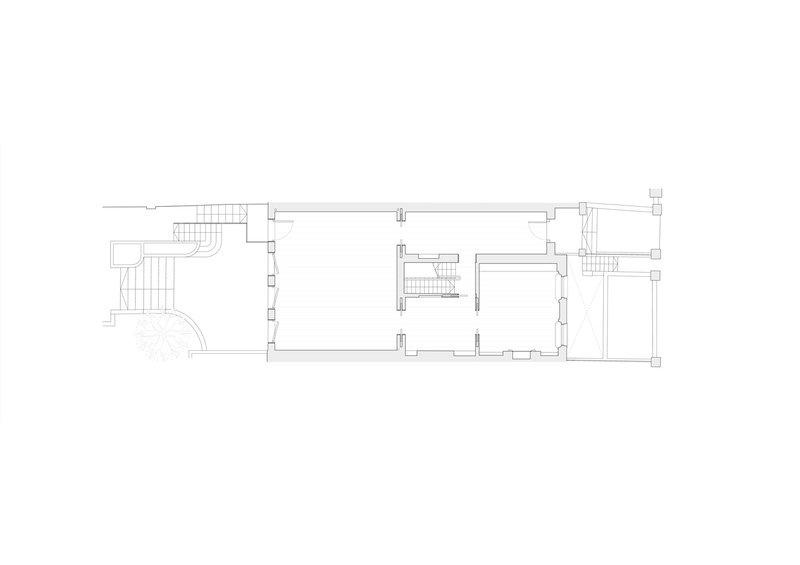 Floor plan drawing showing the upper level with central stairwell and rooms flanking both sides