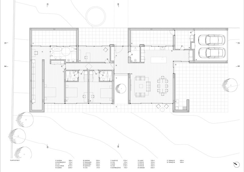 Floor plan drawing showing residential rooms arranged around a central living and dining space with garage