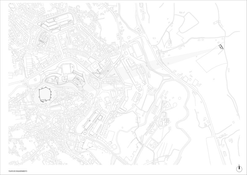 Site plan drawing showing urban street network and building footprints with topographic contours