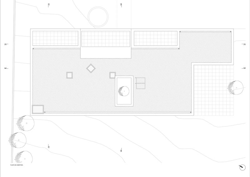 Roof plan drawing showing clerestory glazing and textured terrace surfaces with central water feature
