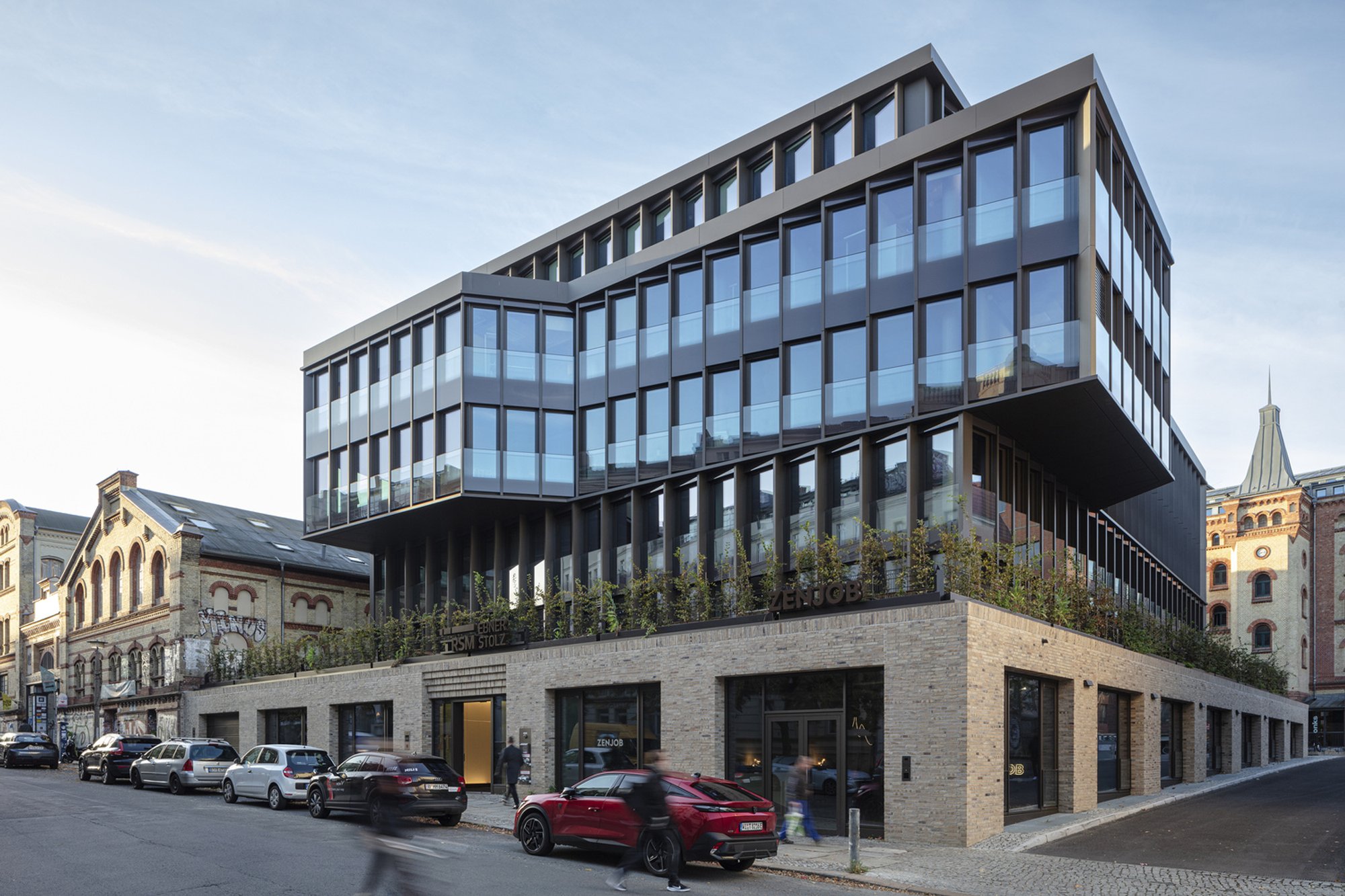 Sergei Tchoban Floats a Dark Glass Office Block Over Berlin's Archaeological Ruins