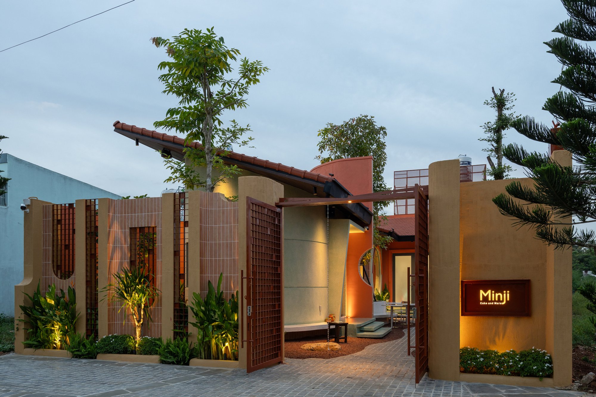 Tiệm Bánh Minji Bakery: Architectural Harmony in Vietnam's Natural Landscape