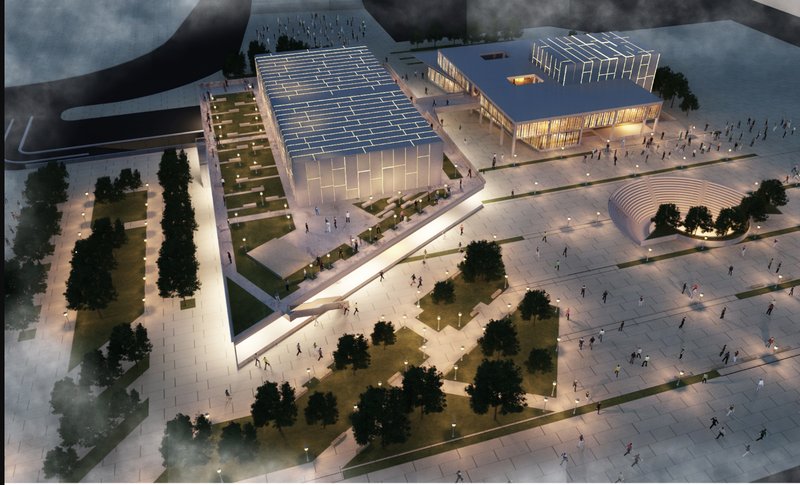 An evening view of the Art Center in Aleppo, showcasing its illuminated design, vibrant plaza.