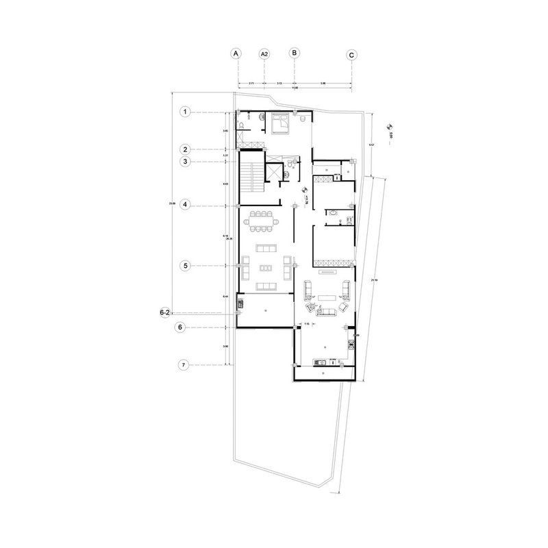 Second floor plan drawing showing bedroom layout with central stair and dining area below