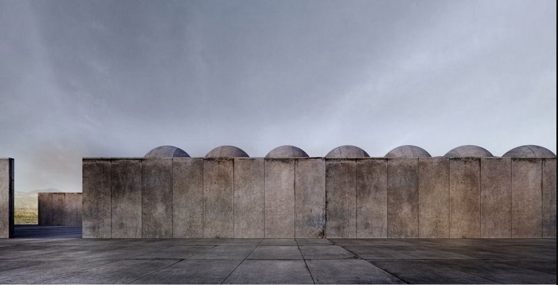 The minimalist design of the Museum of Memory exterior, featuring striking domed elements against an open sky.