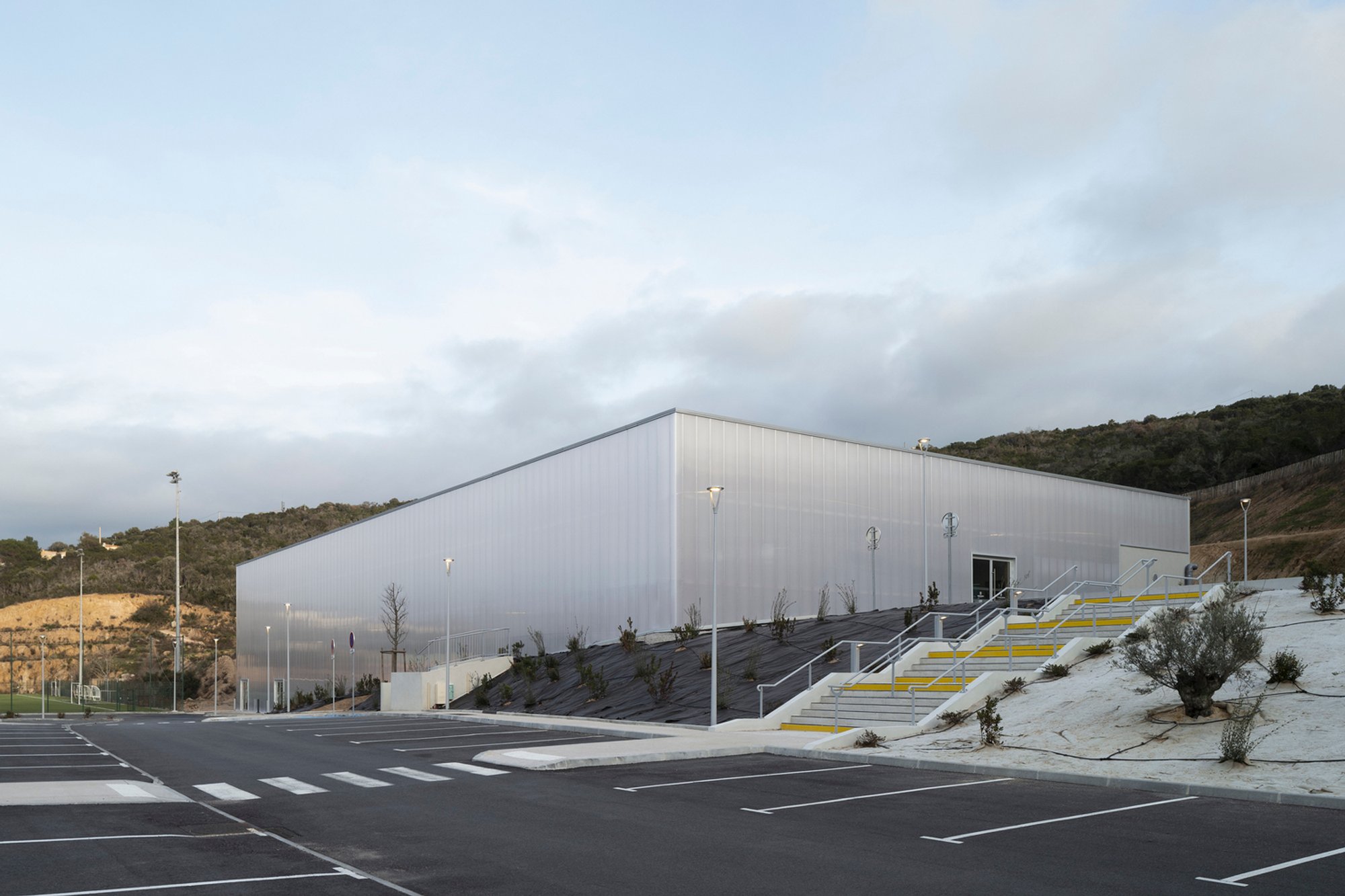 Pietrosella Sports Hall: Architectural Harmony in Corsica