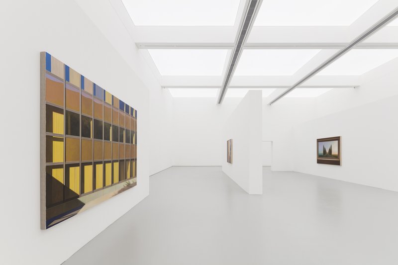 Gallery with painting: large canvas on a white wall, linear skylight above, grey floor, minimal white interior