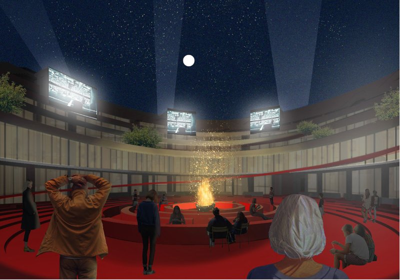 Open-air central arena at night: concentric red seating tiers, a fire or light installation at the centre, projection screens above, moon and stars overhead
