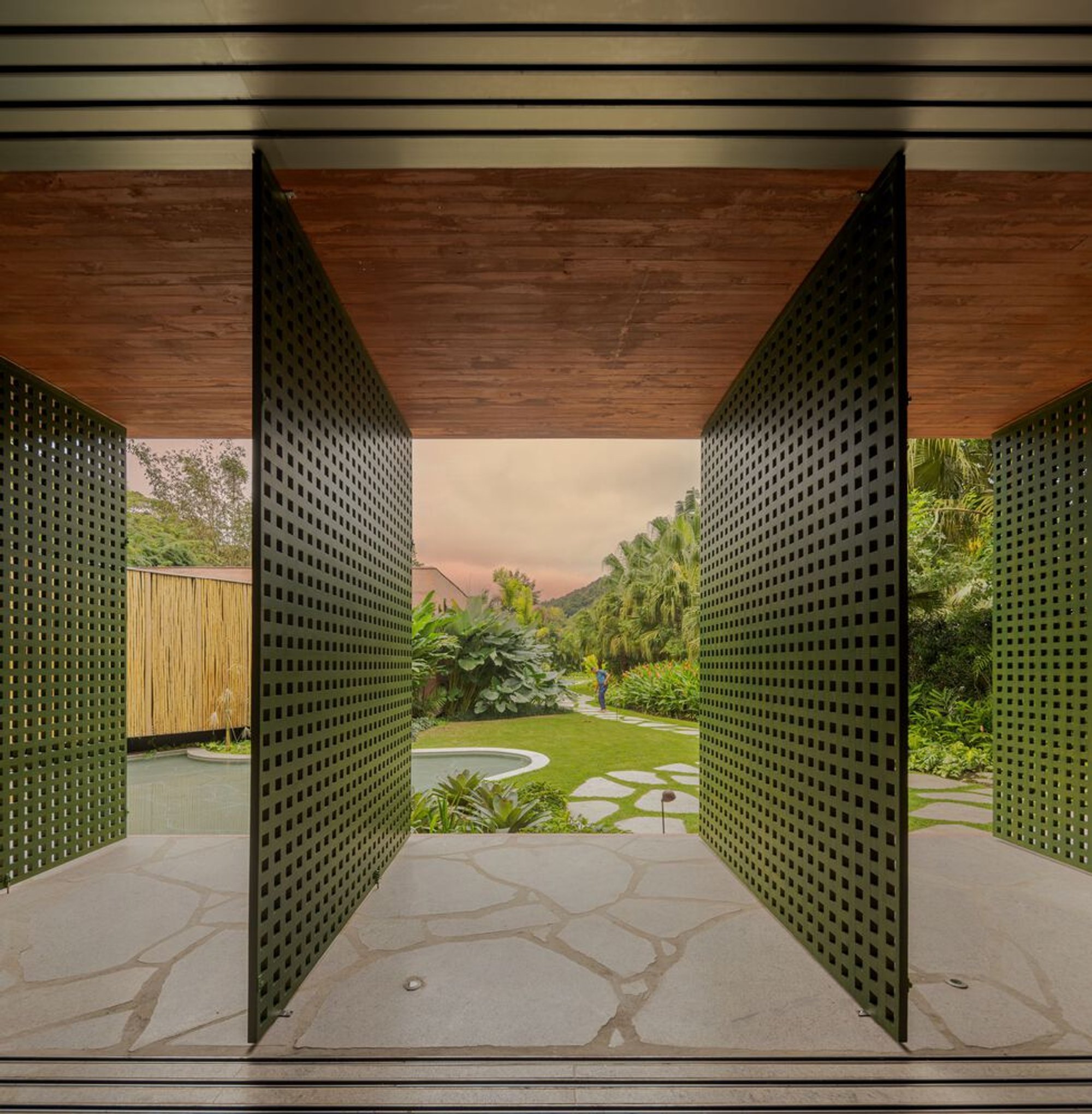 mf+arquitectos Wraps a Brazilian Weekend Retreat in Bamboo, Timber, and Perforated Screens