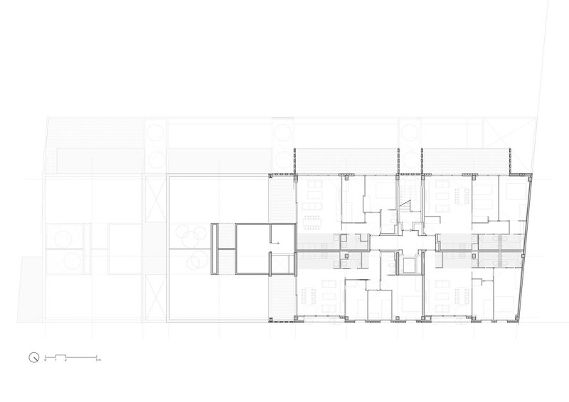 Top floor plan: further setback reducing the footprint, large private terraces, three dwelling units