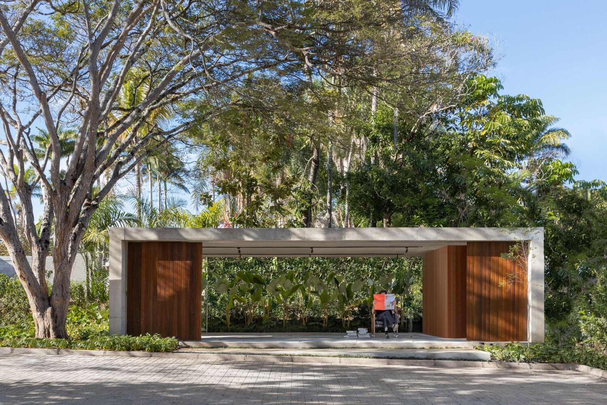 STUDIO PIPPA Nestles a Concrete and Timber Pavilion Beneath a Brazilian Tree Canopy