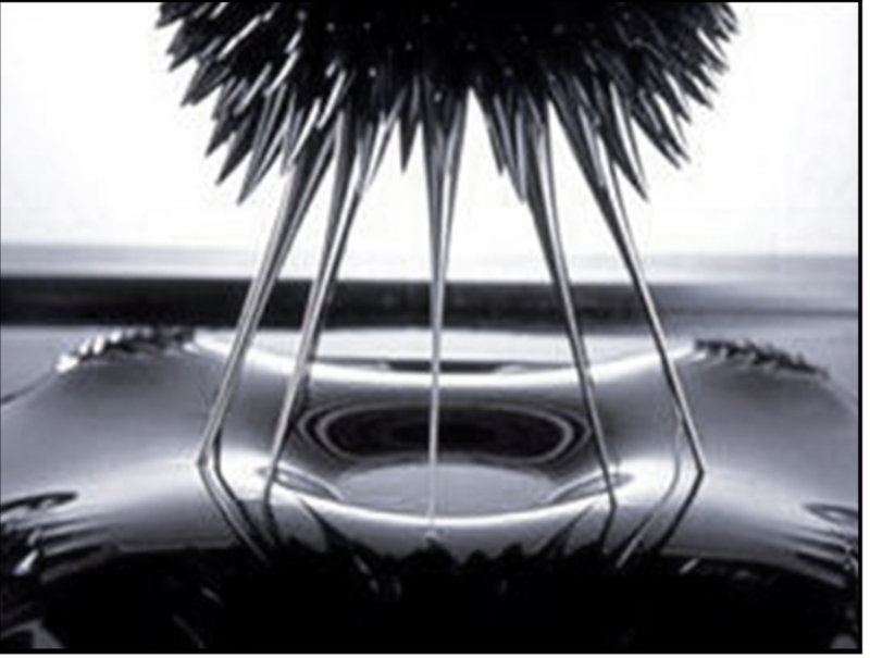 An experimental demonstration of ferrofluid reacting to magnetic fields, the basis of fluid architectural dynamics.
