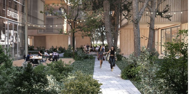 The vibrant communal ground floor promotes social interaction, featuring cafes, green pathways, and open spaces for residents and visitors alike.