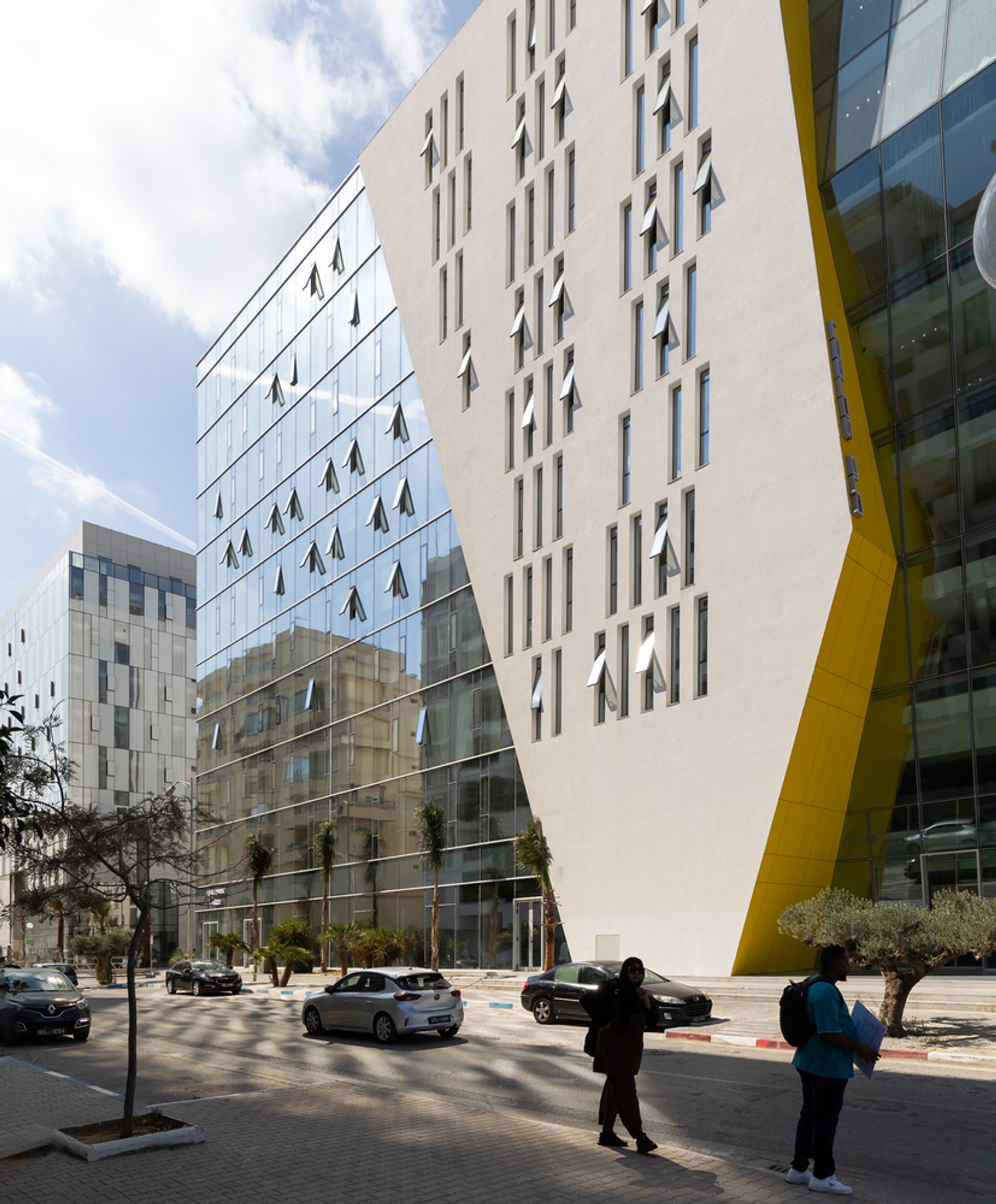 ARK-architecture and AUDA Slash a Fluorescent Yellow Diagonal Through a Tunis Office Tower