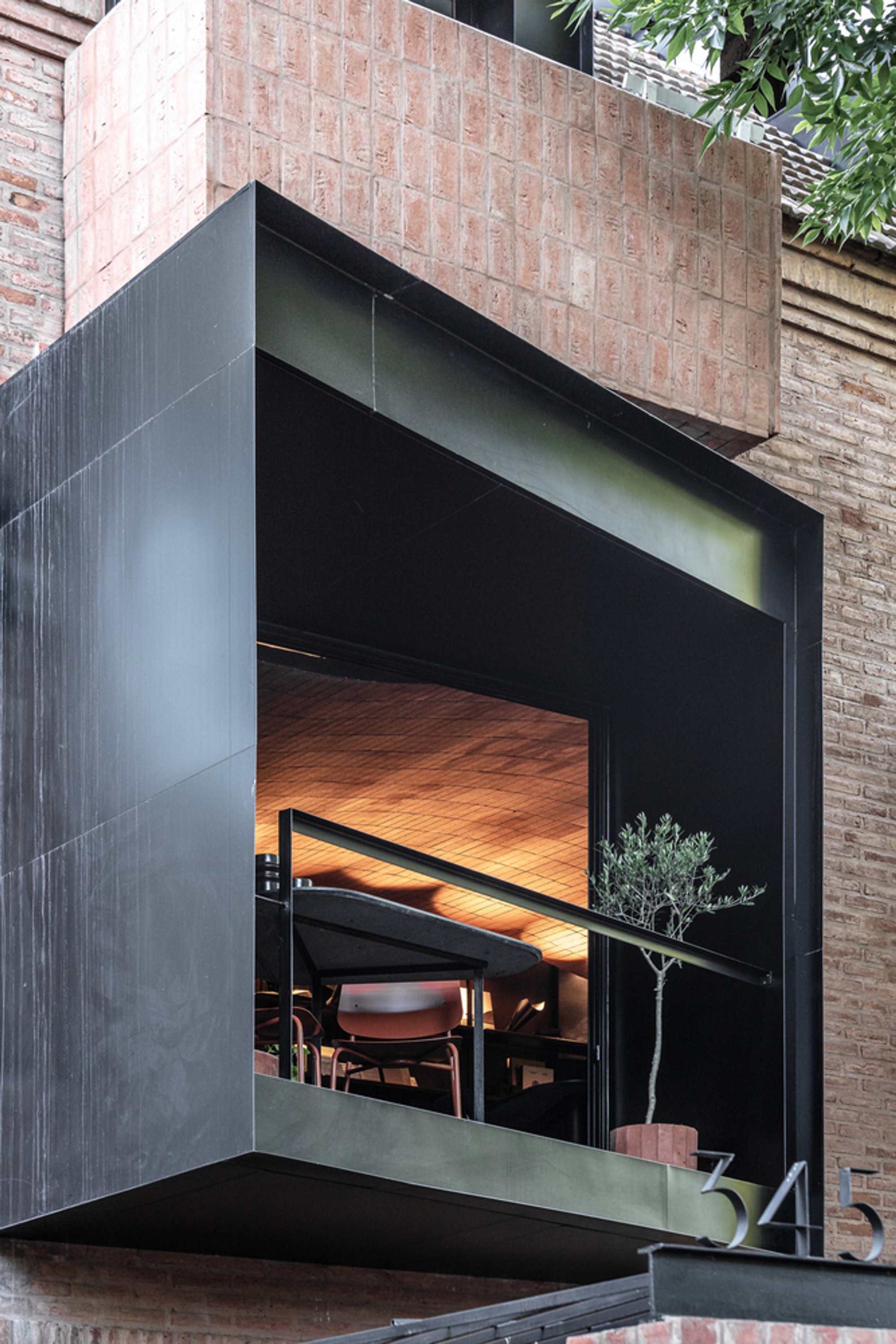 Grizzo Studio Folds a Dental Clinic, a Home, and a Grand Piano into One Buenos Aires Facade