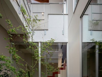KOMINORU Design Carves a Courtyard Heart into a Narrow Japanese Townhouse