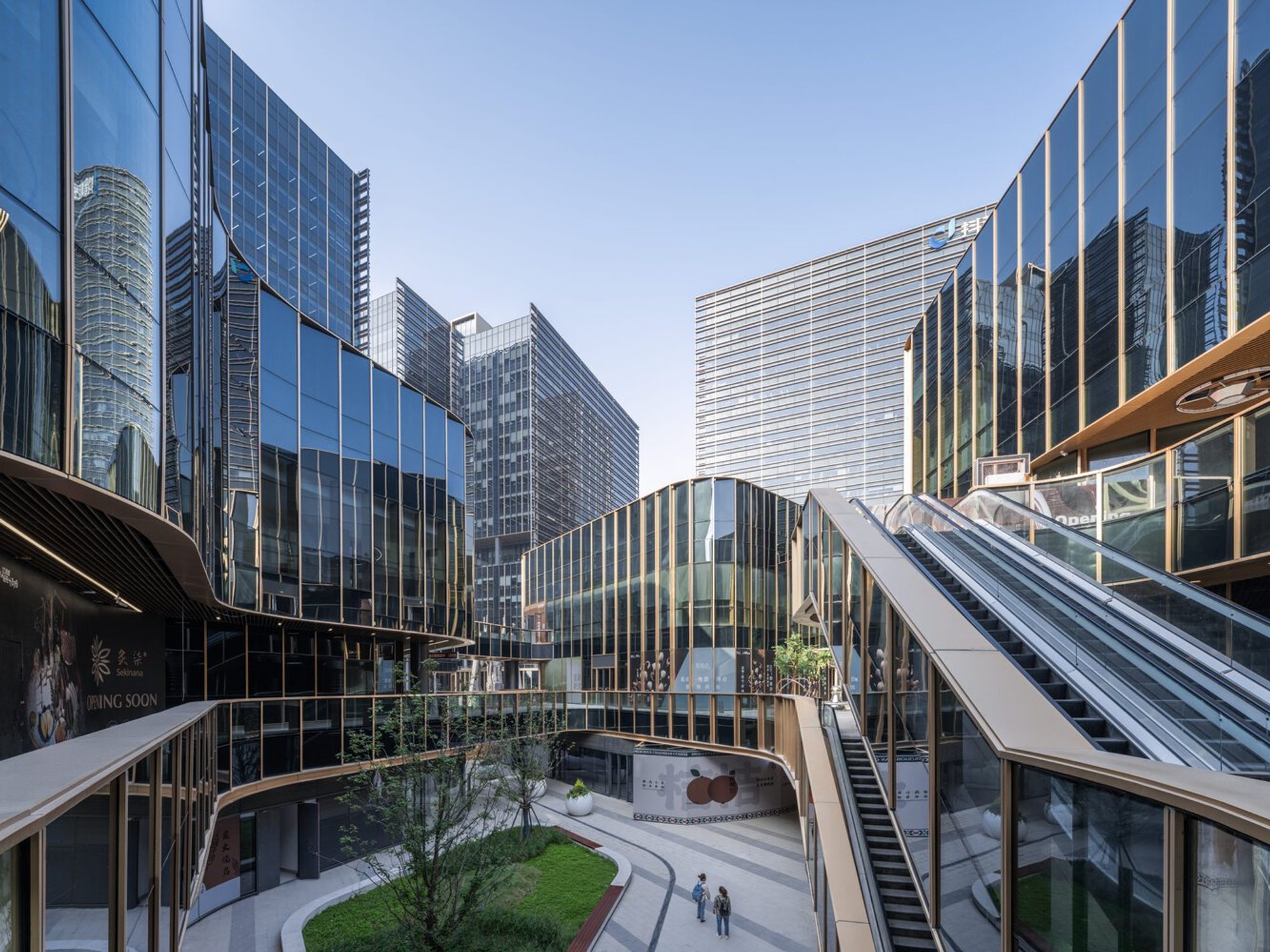 Sustainable Mixed-Use Urban Architecture: The Dynamic Center for "The Springs" by gmp Architects