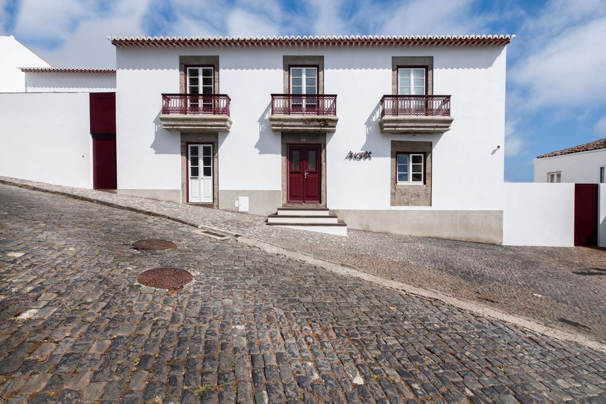 Angra + Hotel Apartments: A Modern Rehabilitation of Historic Architecture in Angra do Heroísmo, Portugal