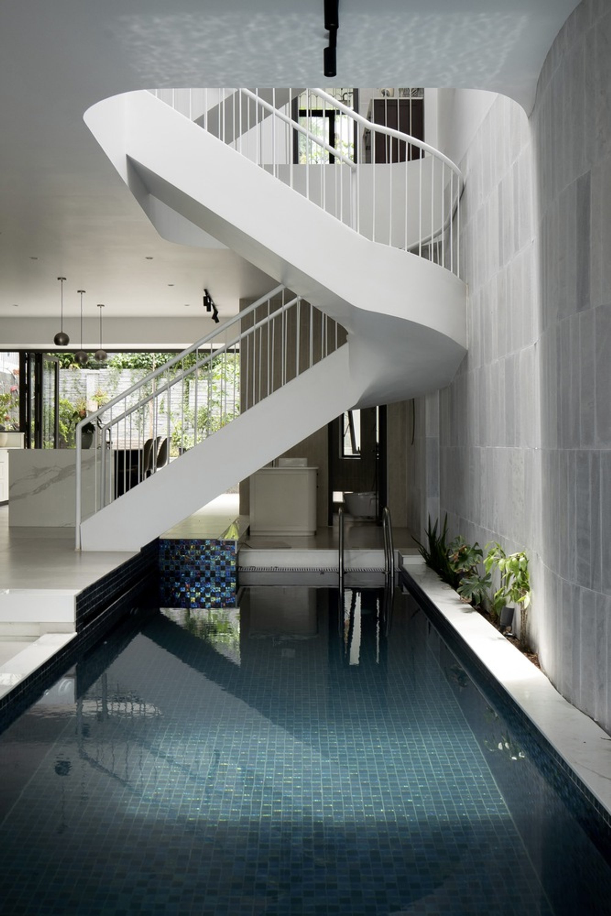 NAQI & Partners Wraps a Nha Trang Pool Villa in Cascading Green Terraces