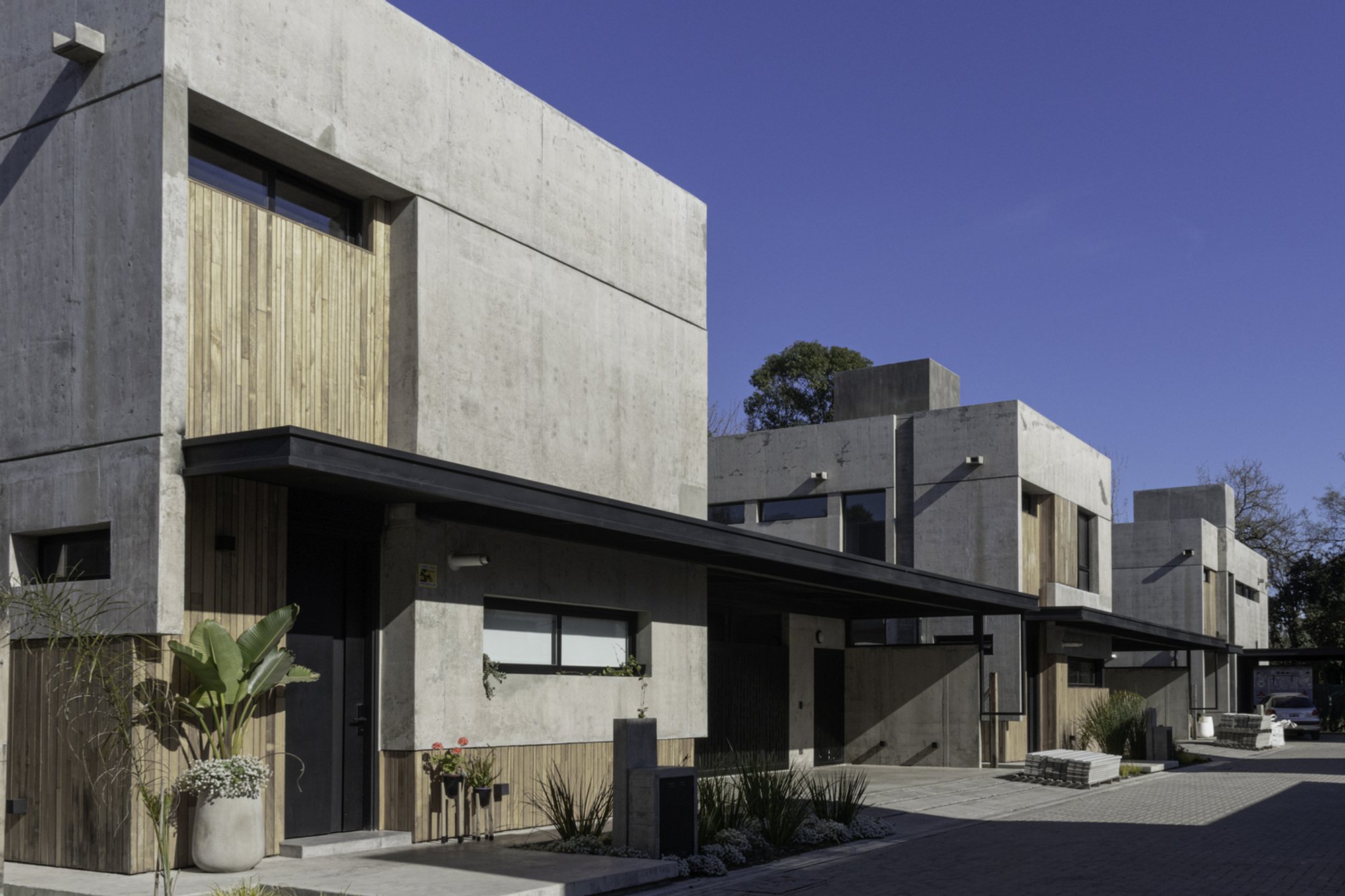 0.7 Arquitectura Builds a Concrete Neighborhood in Patagonia That Balances Privacy with Community