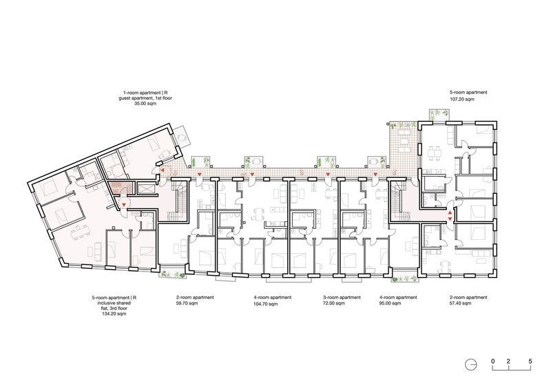 Floor plan showing multiple residential units arranged along a central corridor with varied apartment sizes