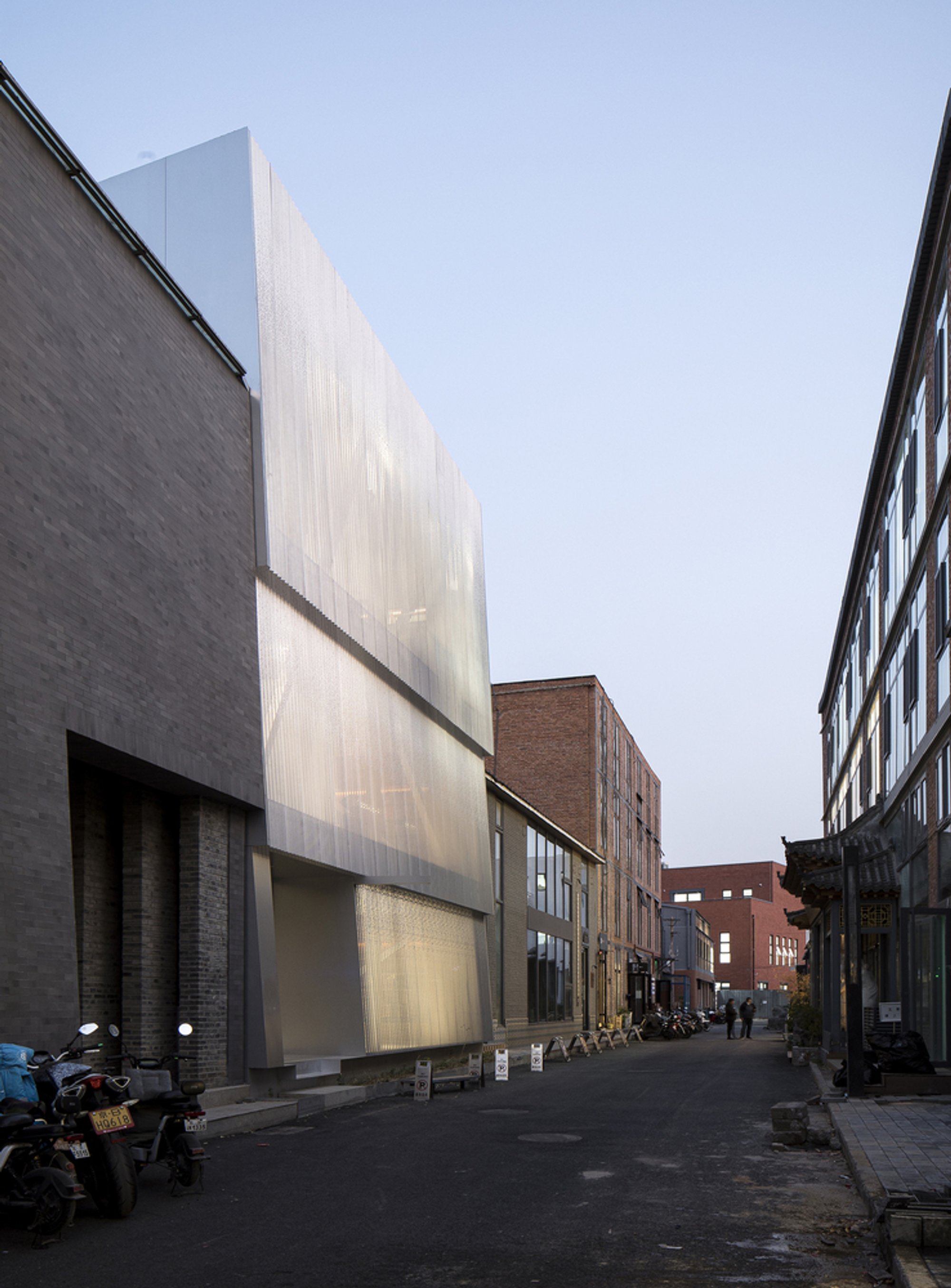 TAOA Wraps Its Own Beijing Studio in Corrugated Metal to Reimagine a 798 Art District Workshop