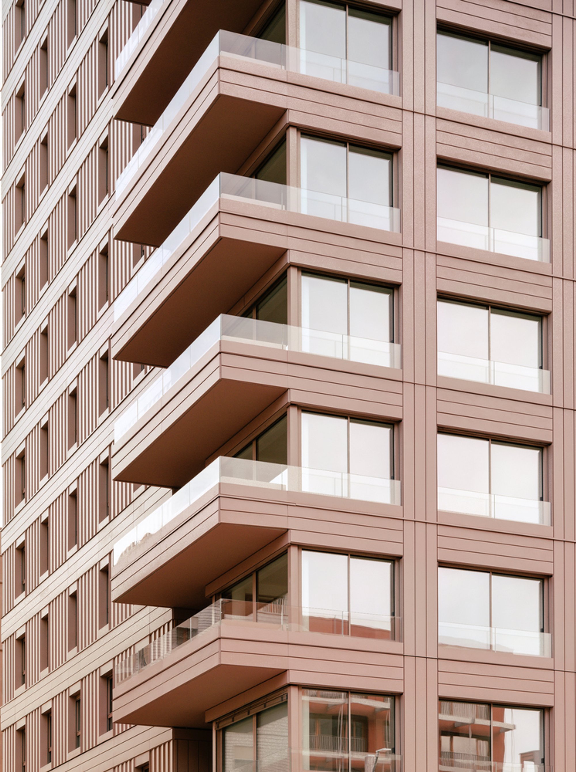 SOA Architectes Wraps Olympic Social Housing in a Single Terracotta Skin on the Banks of the Seine
