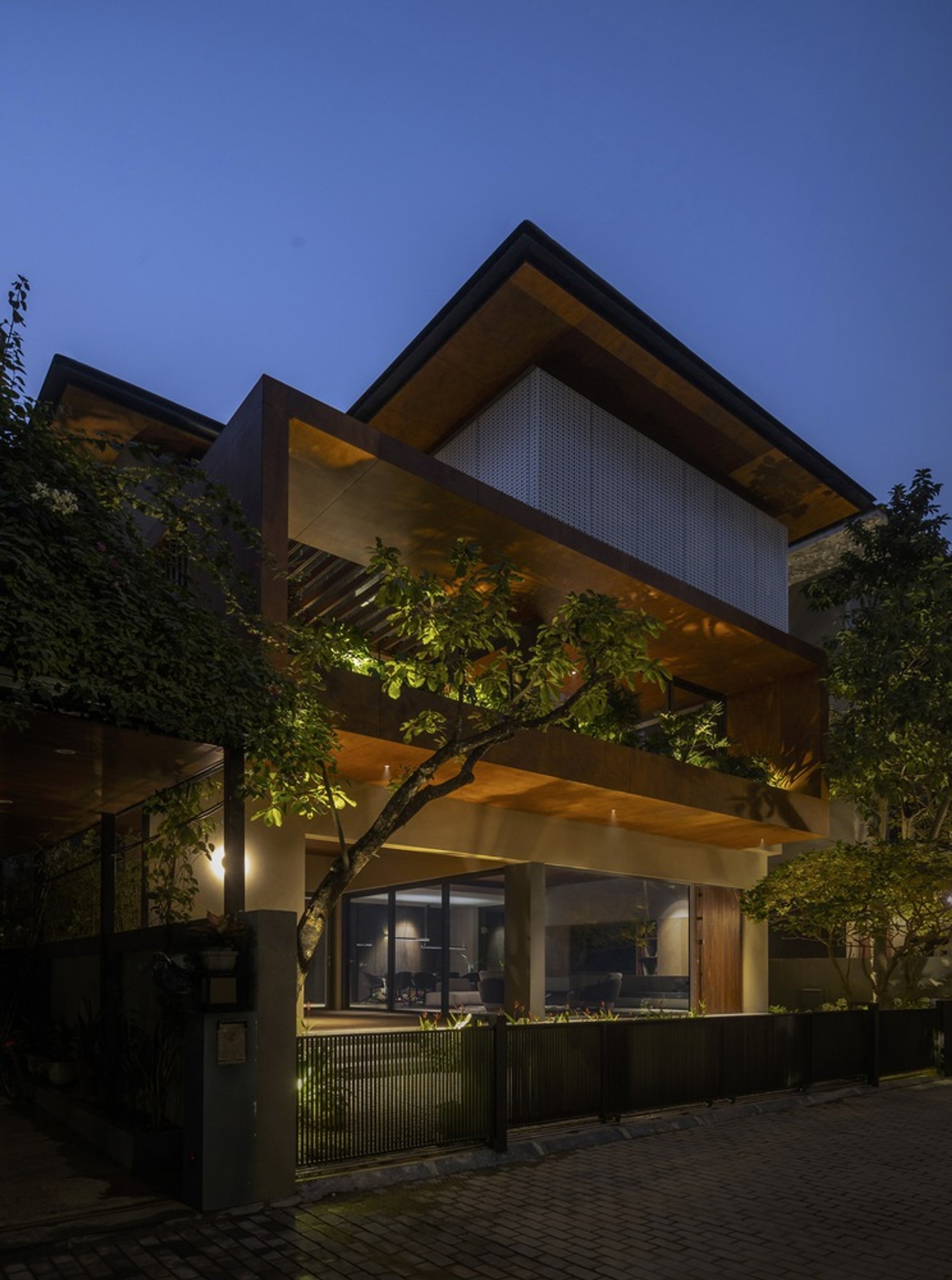 APDI Weaves Courtyards Through a Three-Level Hanoi Villa to Cool It from the Inside Out