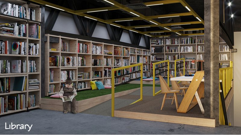 Library interior with floor-to-ceiling bookshelves, yellow metal frames, and a child reading on the carpet