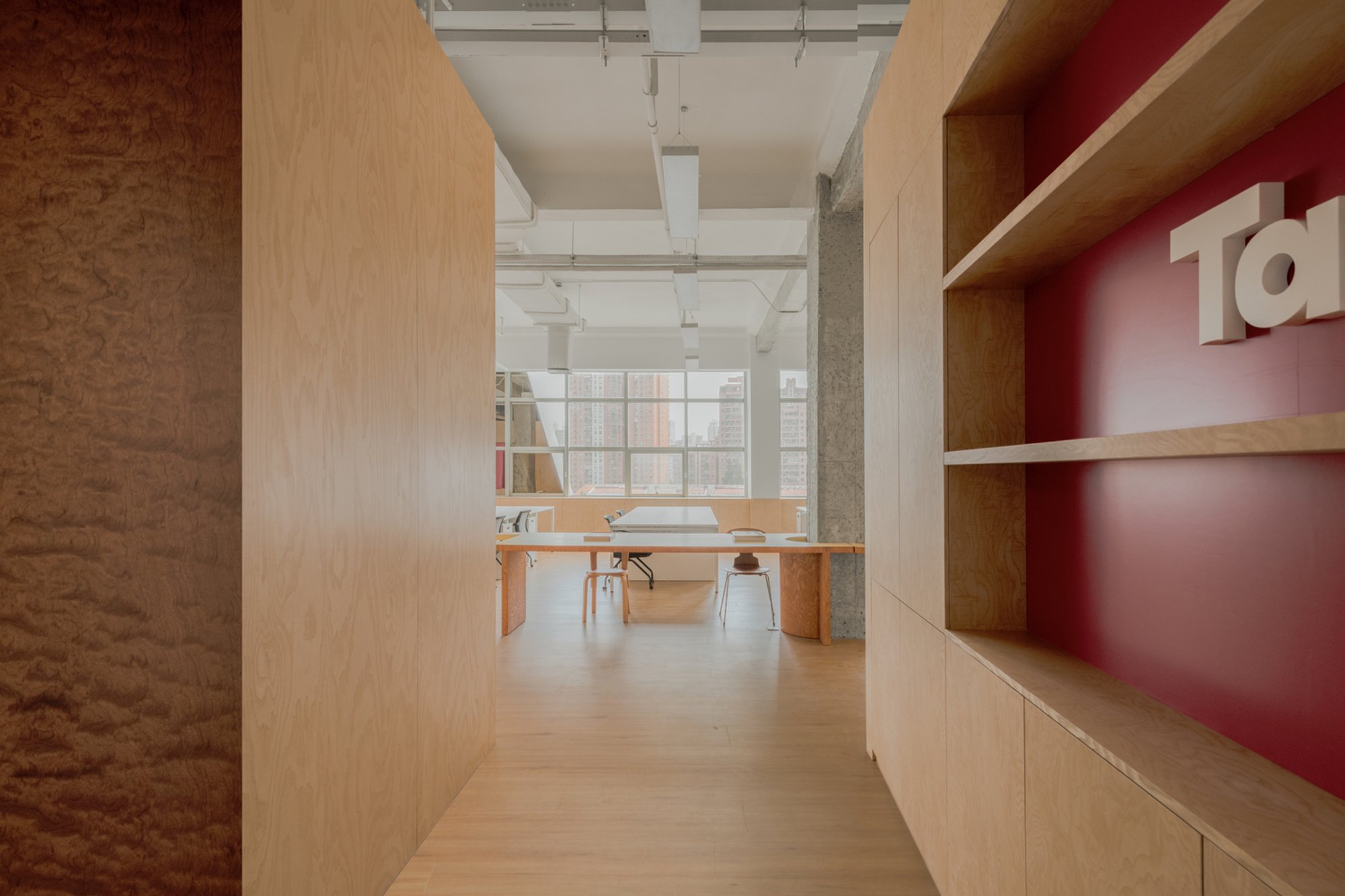 Woodo Studio Wraps a Shanghai Office in Plywood and Punchy Color for Lifestyle Brand Tagi.