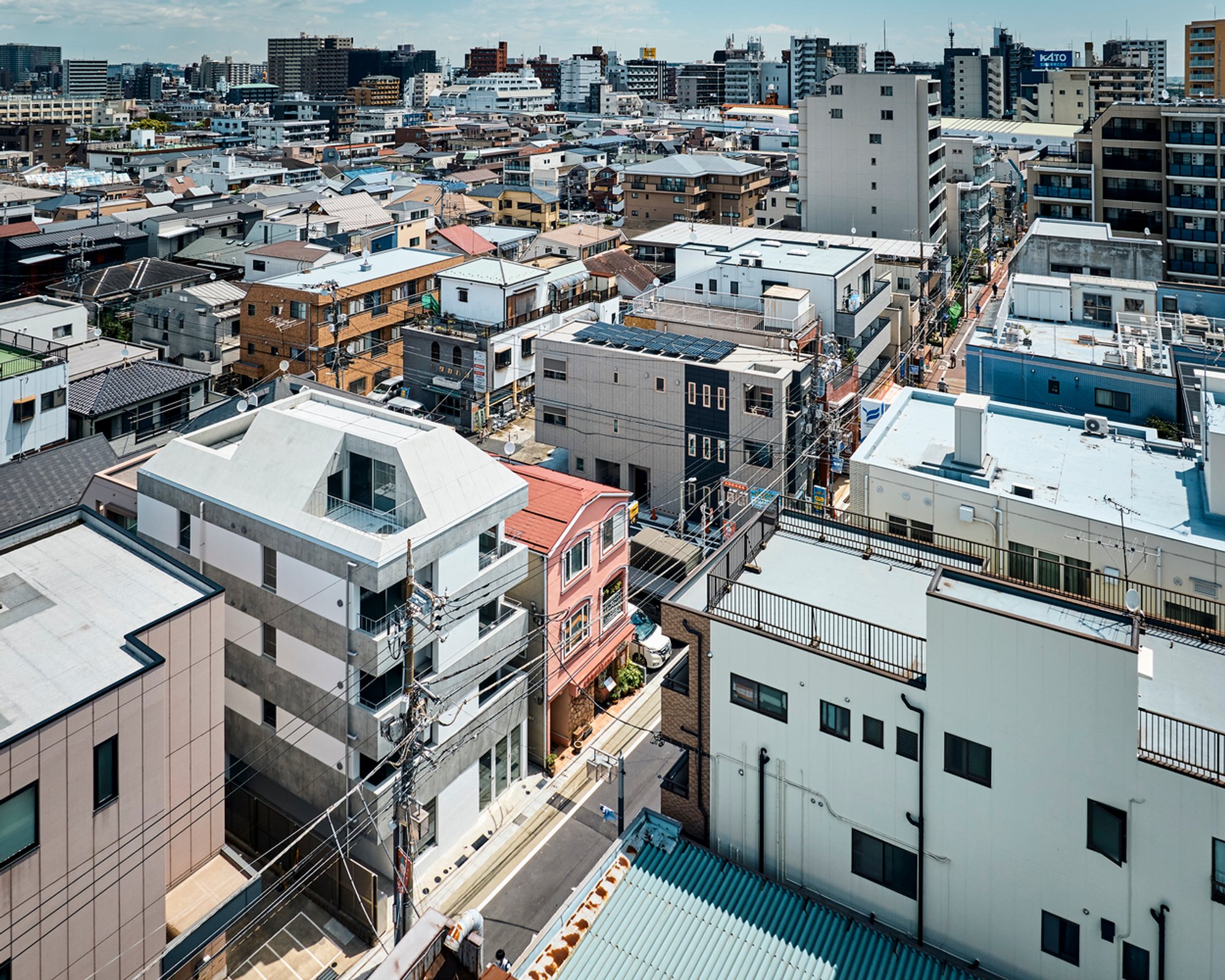 Apartment Complex in Omori-cho by SEITARO ASO ARCHITECTURE INC.