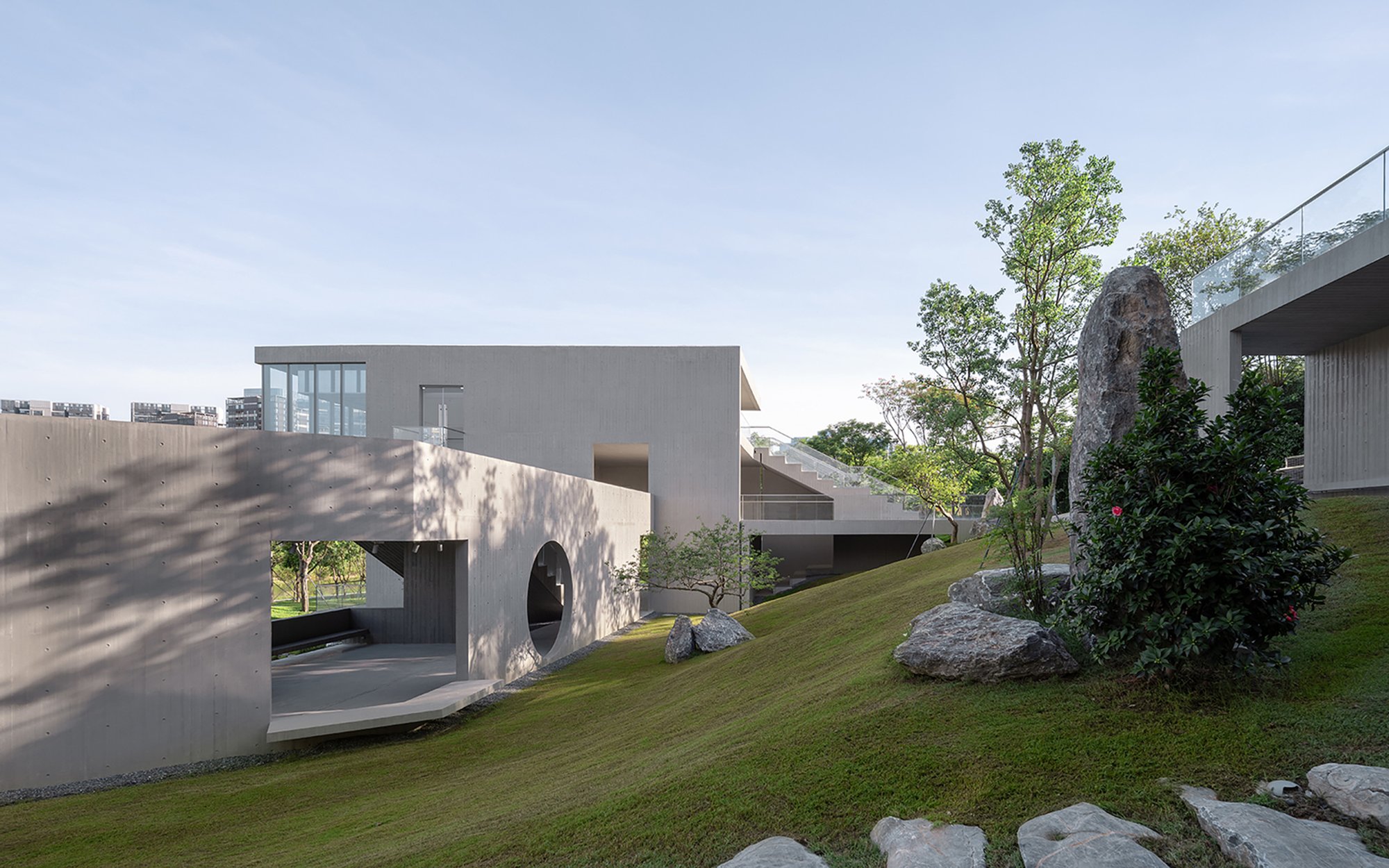 NODE Architecture Pairs a Circular Loft and a Concrete Pavilion in a Shenzhen Park